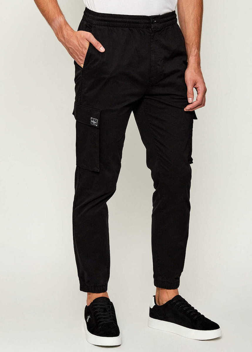 20250910132622_calvin_klein_panteloni_cargo_se_skinny_efarmogi_mayro_lv04rd608g_ub1 ΑΝΔΡΙΚΟ ΠΑΝΤΕΛΟΝΙ SKINNY ELASTIC TWILL CARGO PAN CALVIN KLEIN LV04RD608G-UB1 ΜΑΥΡΟ - Image 1
