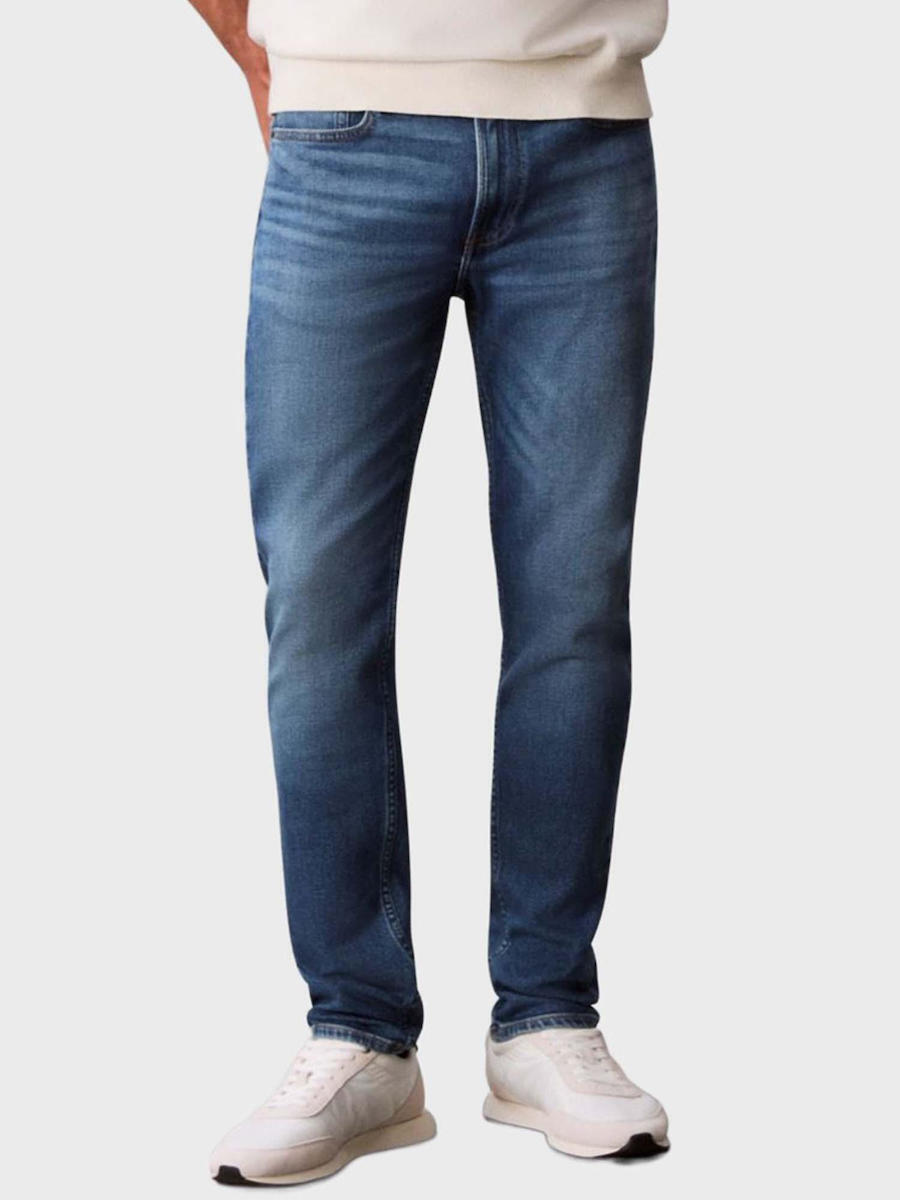 20251014094838_calvin_klein_andriko_panteloni_tzin_me_slim_tapered_efarmogi_klein_blue_lv04rc765g_efd ΑΝΔΡΙΚΟ SLIM TAPER KLEIN BLUE JEAN CALVIN KLEIN LV04RC765G-EFD - Image 1